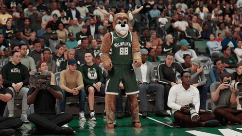 a mascot for the milwaukee bucks stands on the court