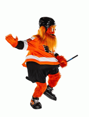 A Mascot Holding A Hockey Stick And Wearing An Orange Jersey GIF