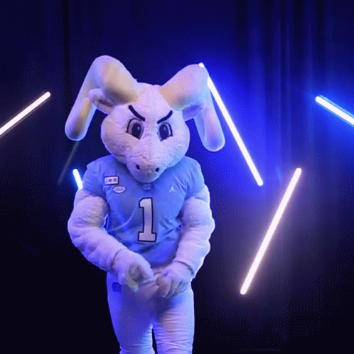 A Mascot Wearing A Blue Jersey With The Number 1 GIF