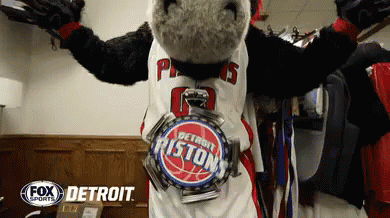 A Mascot Wearing A Detroit Pistons Jersey GIF