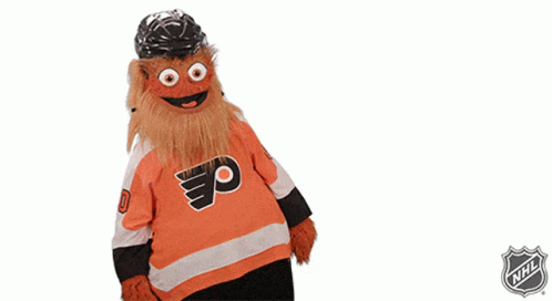 A Mascot Wearing A Flyers Jersey With A Helmet On His Head GIF