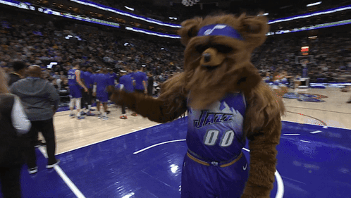 A Mascot Wearing A Jersey That Says Jazz 00 GIF