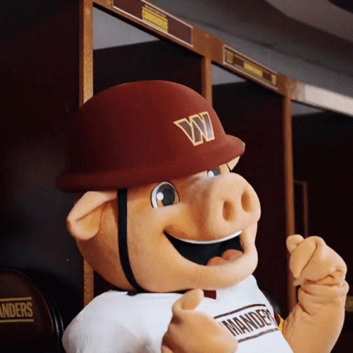 A Mascot Wearing A W Hat And A Shirt That Says Mander GIF