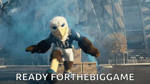 A Mascot With The Words Ready For The Big Game Behind It GIF