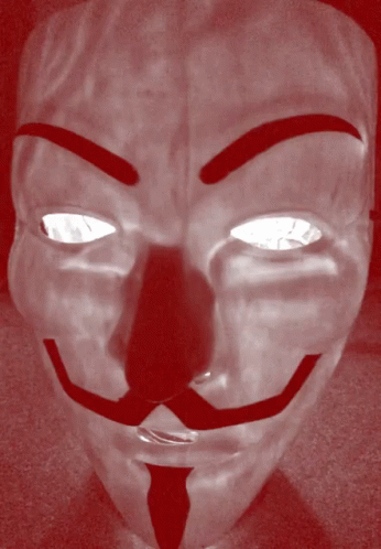 A Mask With A Mustache And Eyebrows Has A Red Background GIF