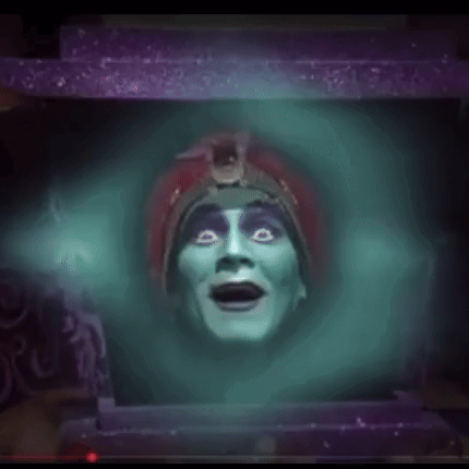A Mask With A Ring Around It And A Crown On It GIF