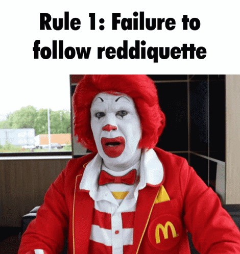 A Mcdonald 'S Clown With A Red Wig And White Face GIF