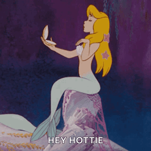 A Mermaid Is Sitting On A Rock Holding A Pearl And Says Hey Hottie GIF