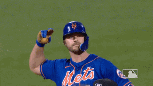 A Mets Baseball Player Wearing A Blue Jersey With The Number 20 GIF