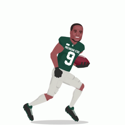 a michigan state football player running with a football