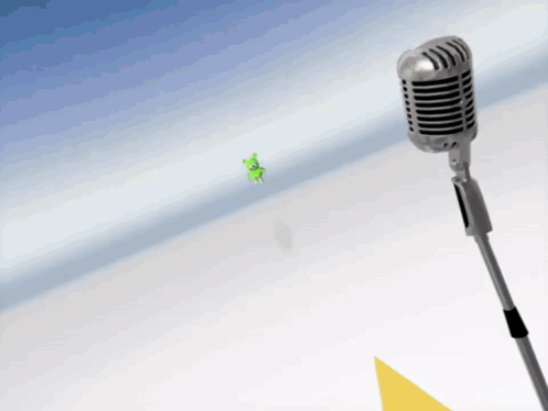 A Microphone With A Green Cartoon Character Flying In The Background GIF