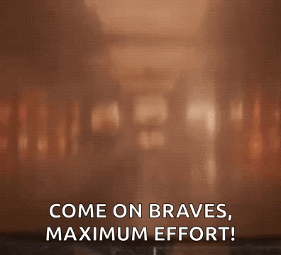 a microwave oven with the words come on braves maximum effort written on it