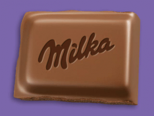 A Milka Chocolate Bar Is Against A Purple Background GIF