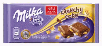 A Milka Chocolate Bar With Crunchy Corn On Top GIF