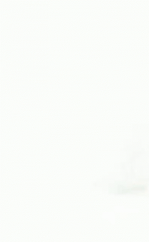 A Milkshake In A Glass With Two Straws GIF