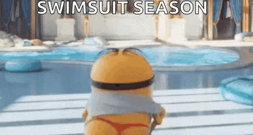A Minion Is Standing Next To A Swimming Pool Wearing A Swimsuit . GIF