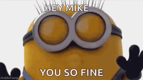 A Minion Wearing Goggles And Gloves Is Saying `` Hey Mike , You So Fine '' . GIF