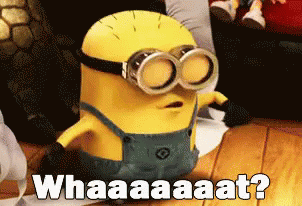 A Minion Wearing Goggles And Overalls Says Whaaaaat GIF
