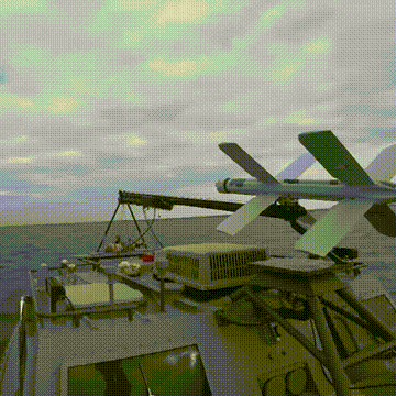 A Missile Is Being Launched From A Military Ship GIF