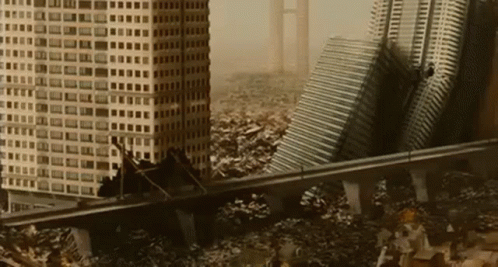 A Model Of A City Destroyed By An Earthquake With A Bridge In The Foreground GIF