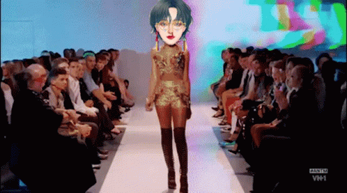 A Model Walks Down The Runway At A Fashion Show On Vh1 GIF