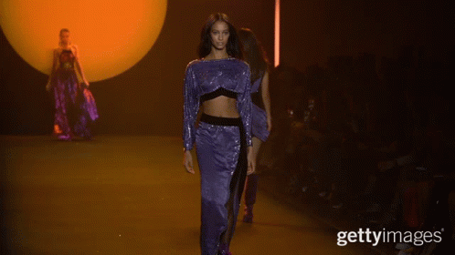 A Model Walks Down The Runway At A Fashion Show With The Caption Gettyimages GIF