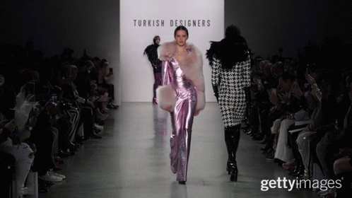 A Model Walks Down The Runway At A Turkish Designers Show GIF