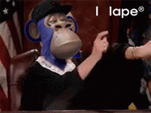 Monkey Judge Sitting At Table With I Lape Text GIF
