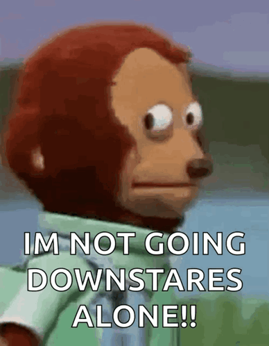 A Monkey With A Green Shirt Says Im Not Going Downstairs Alone GIF