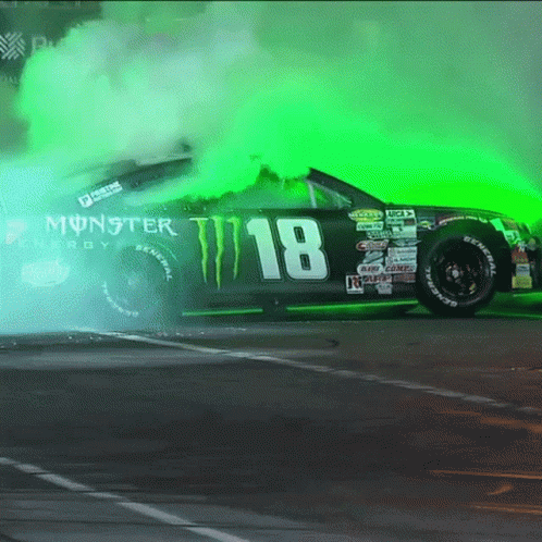 A Monster Energy Car With The Number 18 On The Side GIF