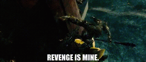 a monster is standing in the water with the words `` revenge is mine '' written above it .