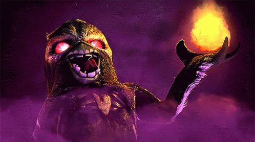A Monster With Red Eyes Holding A Fireball In Its Hand GIF