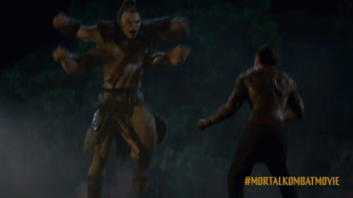 A Mortal Kombat Movie Advertisement With Two Men Fighting GIF