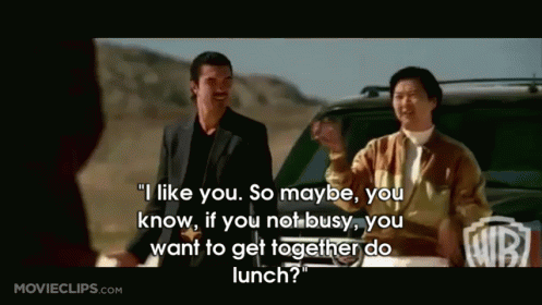 A Movie Clip From Movieclips.com Shows Two Men Standing Next To Each Other In Front Of A Car GIF