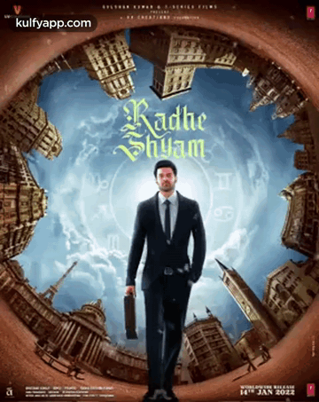 A Movie Poster For Radhe Shyam Shows A Man In A Suit And Tie Holding A Briefcase GIF