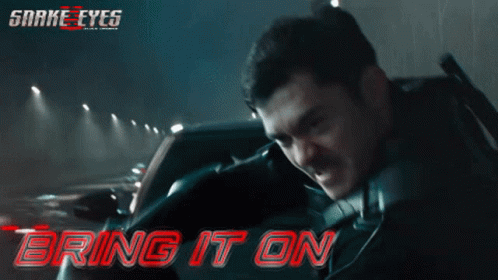 A Movie Poster For Snake Eyes Shows A Man In A Car GIF