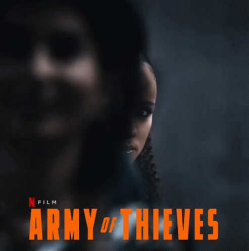 A Movie Poster For The Army Of Thieves Shows A Woman GIF
