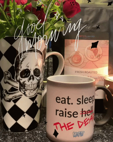 A Mug That Says Eat Sleep Raise Hell The Dead Sits On A Counter GIF