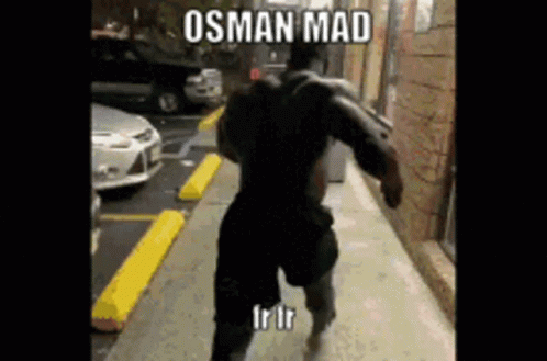 A Muscular Man Is Running Down A Sidewalk With A Caption That Says ' Osman Mad ' GIF
