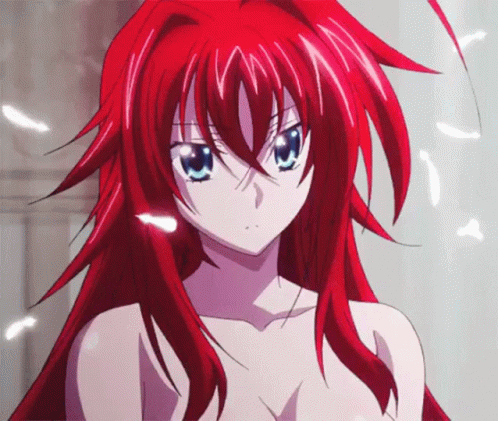 A Naked Anime Girl With Red Hair And Blue Eyes Looks At The Camera GIF