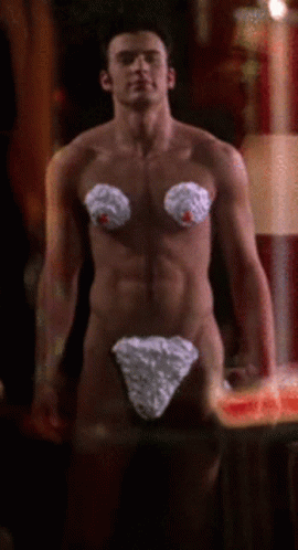 A Naked Man With Whipped Cream On His Breasts GIF