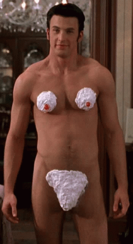 A Naked Man With Whipped Cream On His Chest GIF