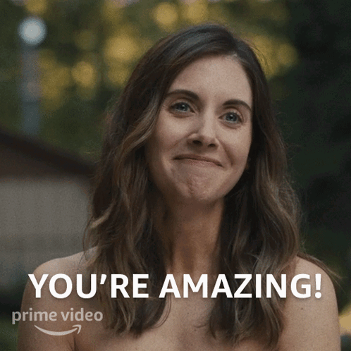 A Naked Woman Is Smiling With The Words You 'Re Amazing On The Bottom GIF