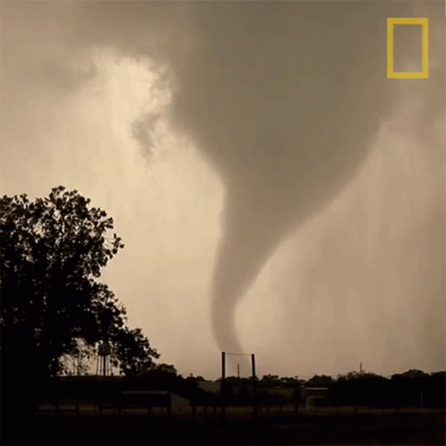 A National Geographic Photo Of A Tornado In A Field GIF
