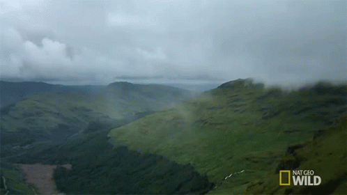 A National Geographic Wild Ad Shows A Landscape Of Mountains GIF