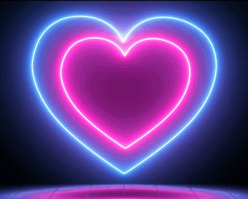 A Neon Heart Is Glowing In The Dark On A Dark Background GIF