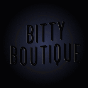 A Neon Sign For The Bitty Boutique Is Lit Up In Blue And Pink GIF