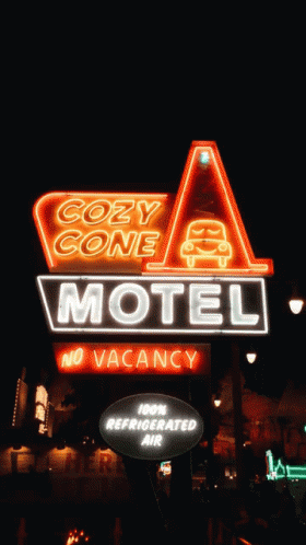 A Neon Sign For The Cozy Cone Motel Says No Vacancy GIF