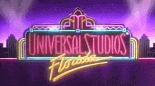 A Neon Sign For Universal Studios Florida With A Purple Background GIF