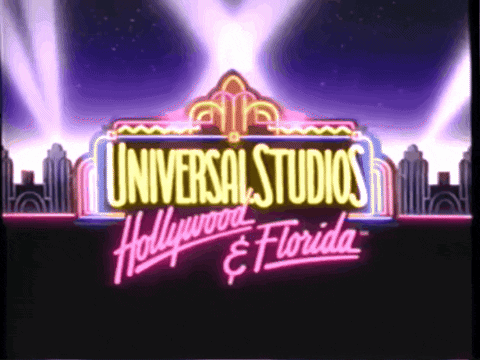 A Neon Sign For Universal Studios Hollywood And Florida Is Lit Up GIF